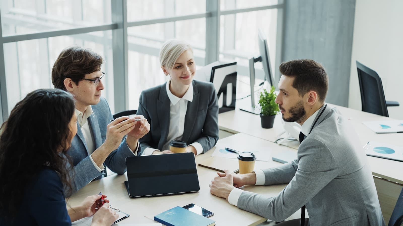 Business operators working through an operating decision
